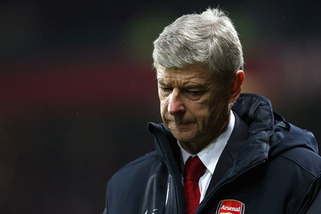 Wenger says his team must keep fighting