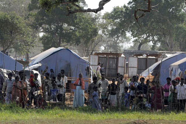 Sri Lankan Tamils captured by government forces and held in a camp for displaced people in the northern district of Vavuniya in 2009