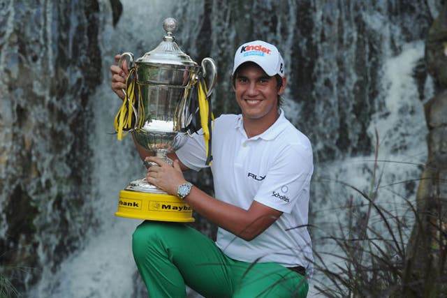Matteo Manassero held off challenges from Gregory Bourdy and Rory McIlroy to win the 2011 Maybank Malaysian Open