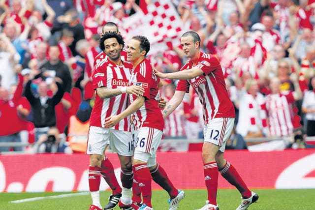 Etherington (centre) scored in the semi-final victory over Bolton Wanderers