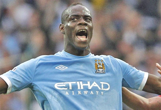 Manchester City's Mario Balotelli 'got carried away' with his celebrations of the FA Cup win over rivals United