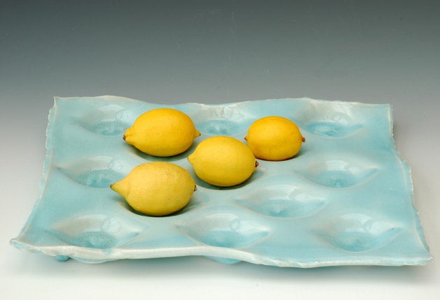 {1} FRUIT TRAY<br/>Make the fruit the centre ofattention with a dimpled traymade to order by ceramic artist Joanna Howells. Choose from a restrained speckled parchment finish or go crazy with a tray iniridescent sky blue.<br/>£85, notonthehighstreet.