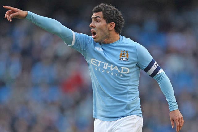 Mancini says Tevez has told him he wants to stay