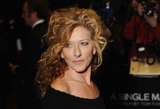 Interior designer Kelly Hoppen today accepted £60,000 in settlement of her High Court action
