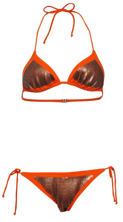 Irwin and Jordan<br/>

Not for the shy and retiring, this is a teeny-weeny futuristic red bikini. The matt gold sequin triangles catch the sun in an eye-catching way so you'll never be short of admirers wearing this. Those who are slightly less body-confi