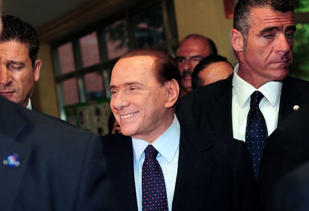 Italian Prime Minister Silvio Berlusconi played down the significance of a coming referendum on nuclear power