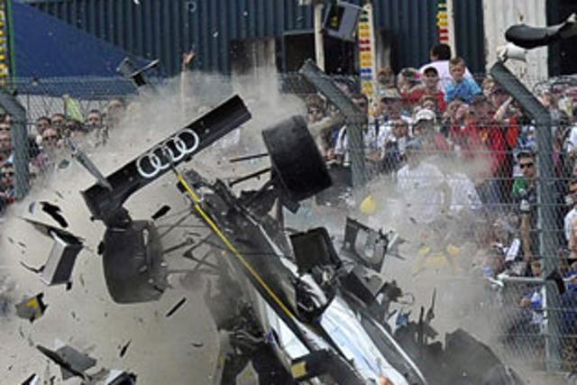 &#13;
McNish suffered a high-speed accident at Le Mans in 2011 (EPA)&#13;