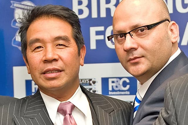 The Birmingham City owner Carson Yeung (left) and vice-chairman Peter Pannu