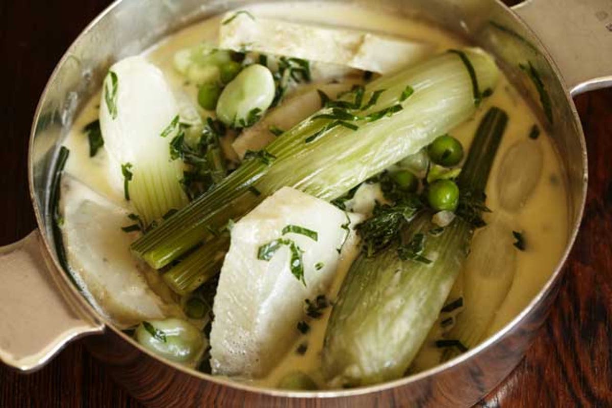 Vegetable casserole with artichokes, fennel, peas, broad beans and