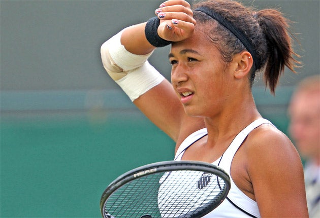 Heather Watson was hampered by an elbow injury in her first-round Wimbledon exit