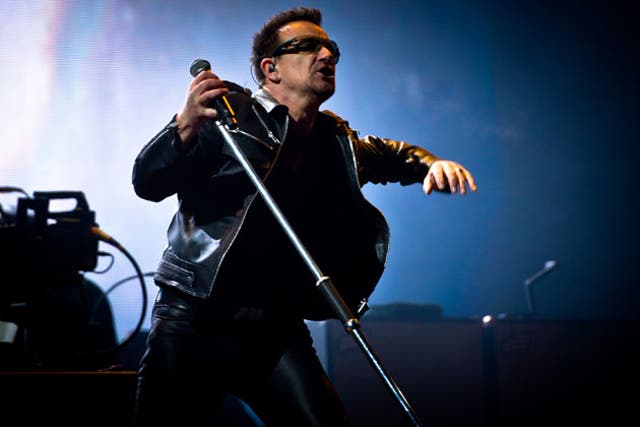 <p>Throwing shade: Bono went for the wraparound look to create his insectoid alter-ego</p>