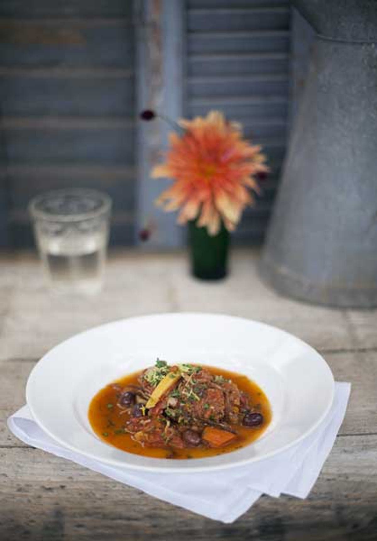 Slowcooked veal with preserved lemons and black olives The