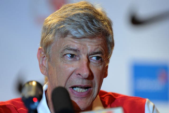 Wenger is unhappy with the courting of Nasri and Fabregas