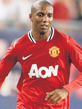 Ashley Young says he is delighted to be with United