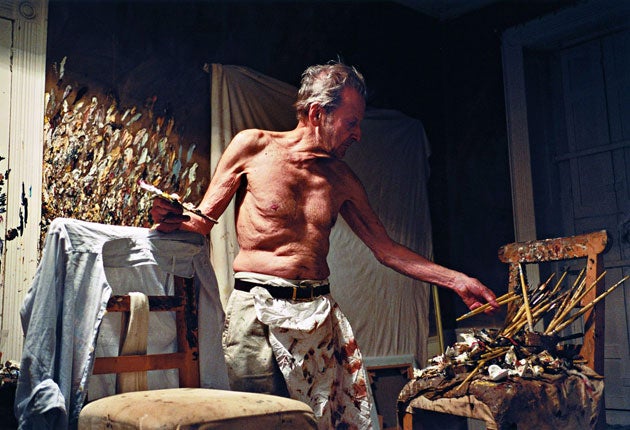 Lucian Freud, who died in 2010, at work in his studio