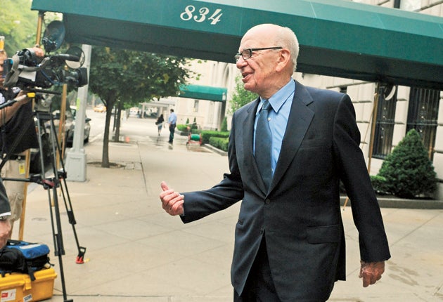 Rupert Murdoch has vowed to co-operate fully with investigators