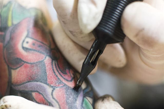 Under the tattooist's needle