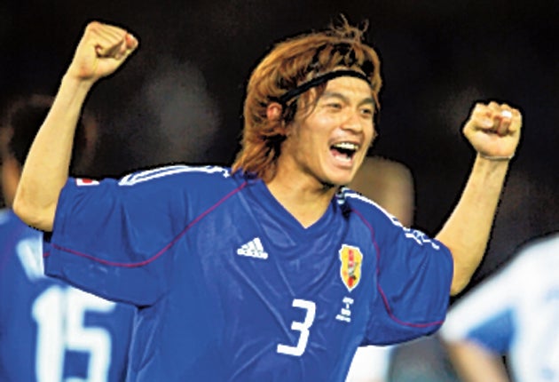 Naoki Matsuda celebrates victory during the 2002 World Cup