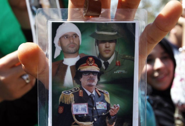 Military commander Khamis Gaddafi (right) was killed in a Nato attack, rebels claim