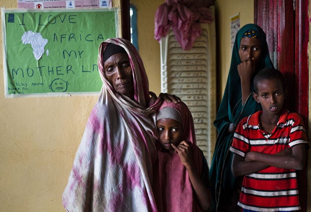 Seventy-year-old Salado Ali Haron, whose sight is impaired, brought her three grandchildren - Ebyan, eight, Fatima, 15, and Abdi, 13 - to Dadaab from Somalia after their parents died of starvation