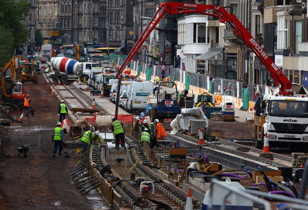 The workmen moved into Princes Street in 2009, but the tram service is now six months behind schedule