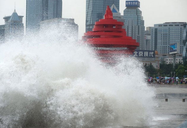 High waters and heavy surf batter China's northern port of Qingdao