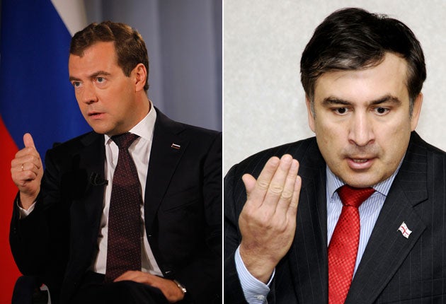 President Medvedev, left, said the Georgian President, Mikheil Saakashvili, should be put on trial for war crimes