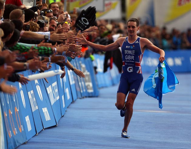 Alistair Brownlee completes his victory yesterday