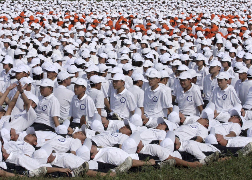 More than 10,000 people participated in a "human dominos" event during the Nadam Fair in Ordos, Inner Mongolia Autonomous Region in August 2010. The participants set a set a new Guinness World record for "human dominoes" in China's Inner Mongolia, toppling a record set a decade earlier in Singapore by more than several hundred.