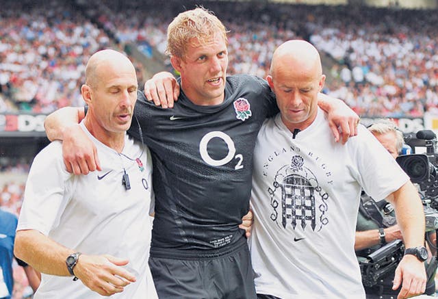 Lewis Moody is helped from the field during England's win over Wales
