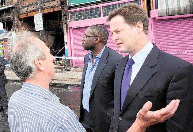 Nick Clegg talks to Tottenham residents after the recent riots