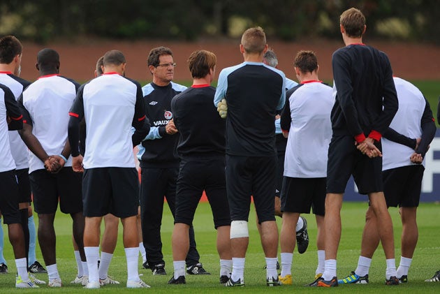 Capello speaks with the players this morning