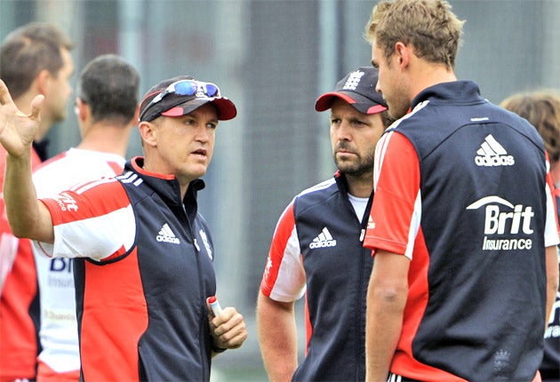 England's brilliant coach Andy Flower talks to Stuart Broad in the nets