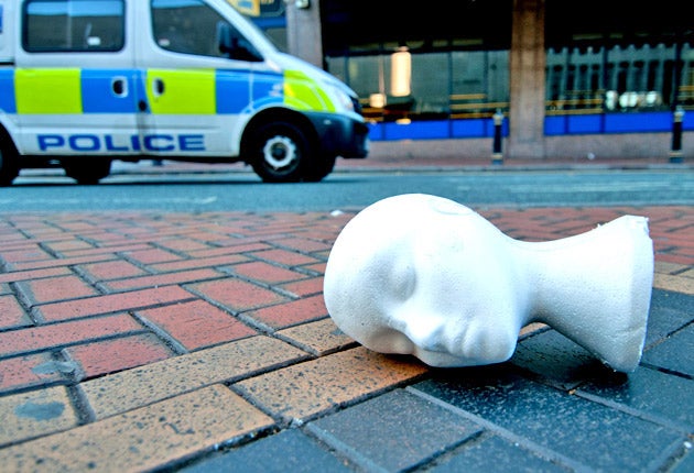 A disembodied mannequin's head, debris from a looted shop on Corporation Street, Birmingham