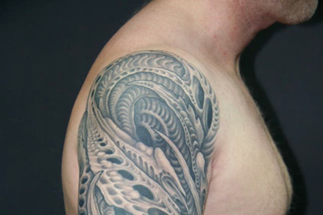 Shoulder to forearm tattoo by Louis Molloy