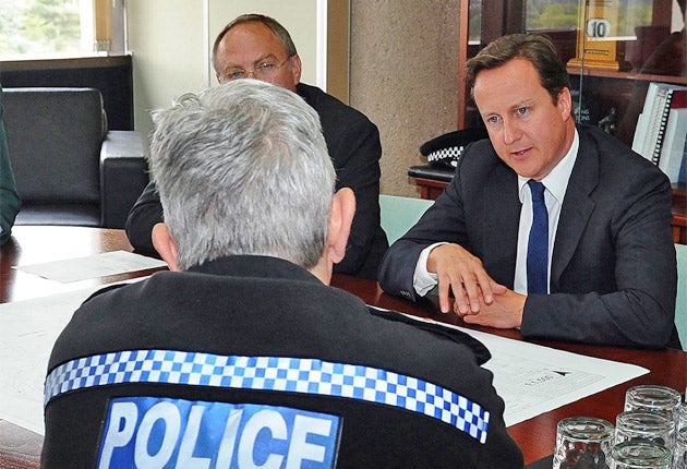 David Cameron meets senior emergency services staff in Wolverhampton yesterday