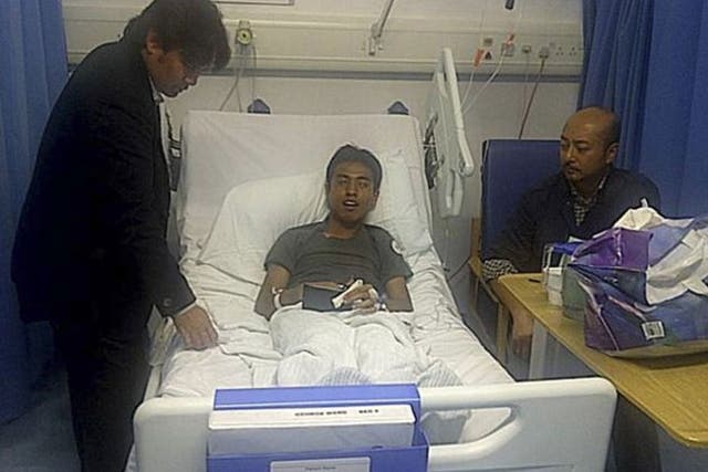 Ashraf Rossli was seen bleeding after being punched in the jaw less than a month after arriving in Britain