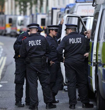 Police officers prepare for Thursday night in Westminster, London