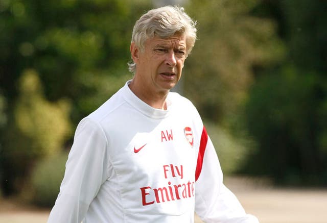 Arsenal manager Arsene Wenger during a training session. The first
couple of months of the season are going to be of huge importance to the club and manger