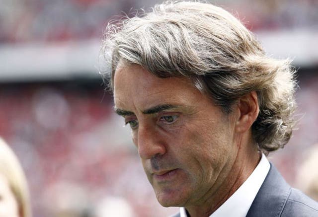 Roberto Mancini and his coaching staff have formed a nucleus removed from the City board