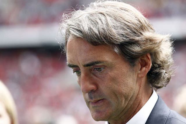 Roberto Mancini and his coaching staff have formed a nucleus removed from the City board