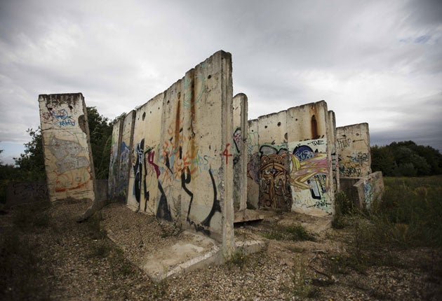 2011: A section of the wall as it stands today, in Teltow, on the edge of
Berlin. Few traces of the wall remain; some were rebuilt recently by conservationists