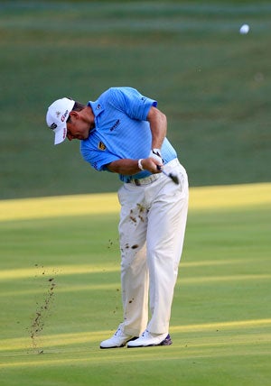 Lee Westwood hits an approach shot on the 10th hole during round two