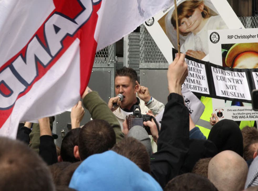 The EDL's founder, Tommy Robinson, seen here at a rally in Blackburn in April, says racists are expelled from the group