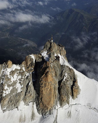 The Aiguille du Midi located in the Mont-Blanc massif in the French Alps