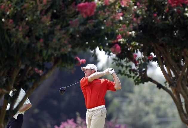 Lee Westwood drives on the eighth hole on his way to a round of one-under par