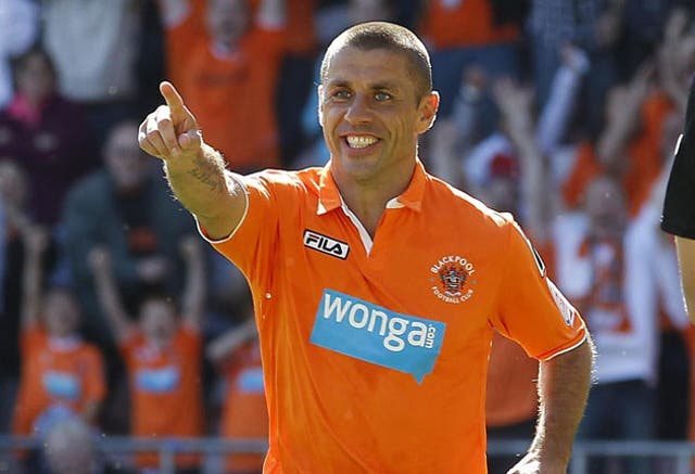 Blackpool's Kevin Phillips celebrates after scoring his second goal yesterday