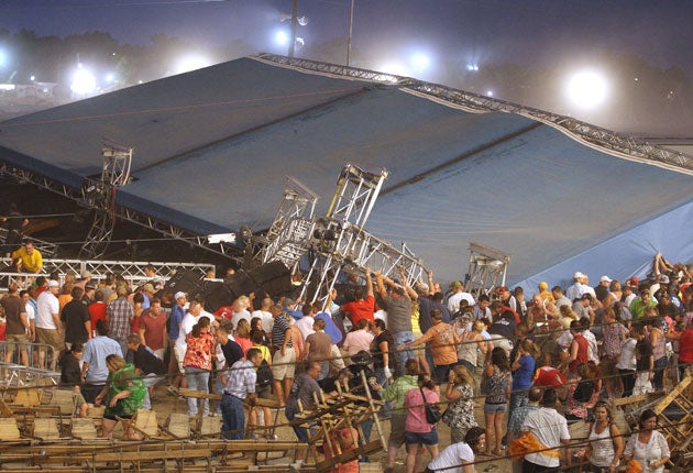 The stage collapses as a storm approaches the Indiana State Fair in Indianapolis on Saturday night