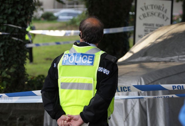 Police at Victoria Crescent, St Helier, Jersey, after six people died in a knife attack