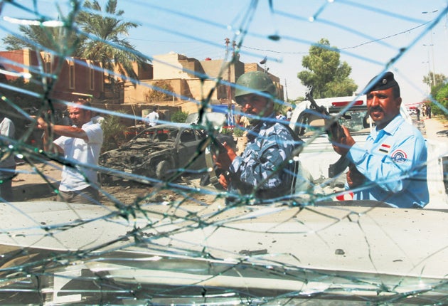 View from a damaged police vehicle after the suicide bomb attack near Najaf
